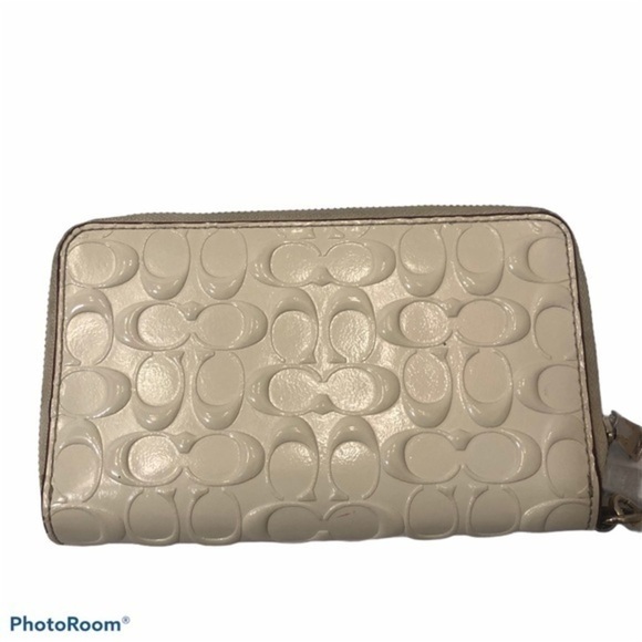 Coach debossed creamy white double zipper wristlet
